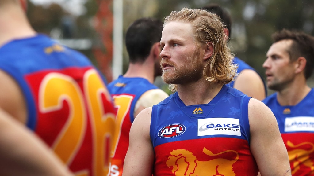 Daniel-Rich-looks-on.jpg Daniel Rich is averaging 23 disposals in 2019 - AFL,Brisbane Lions,Daniel Rich,Chris Fagan